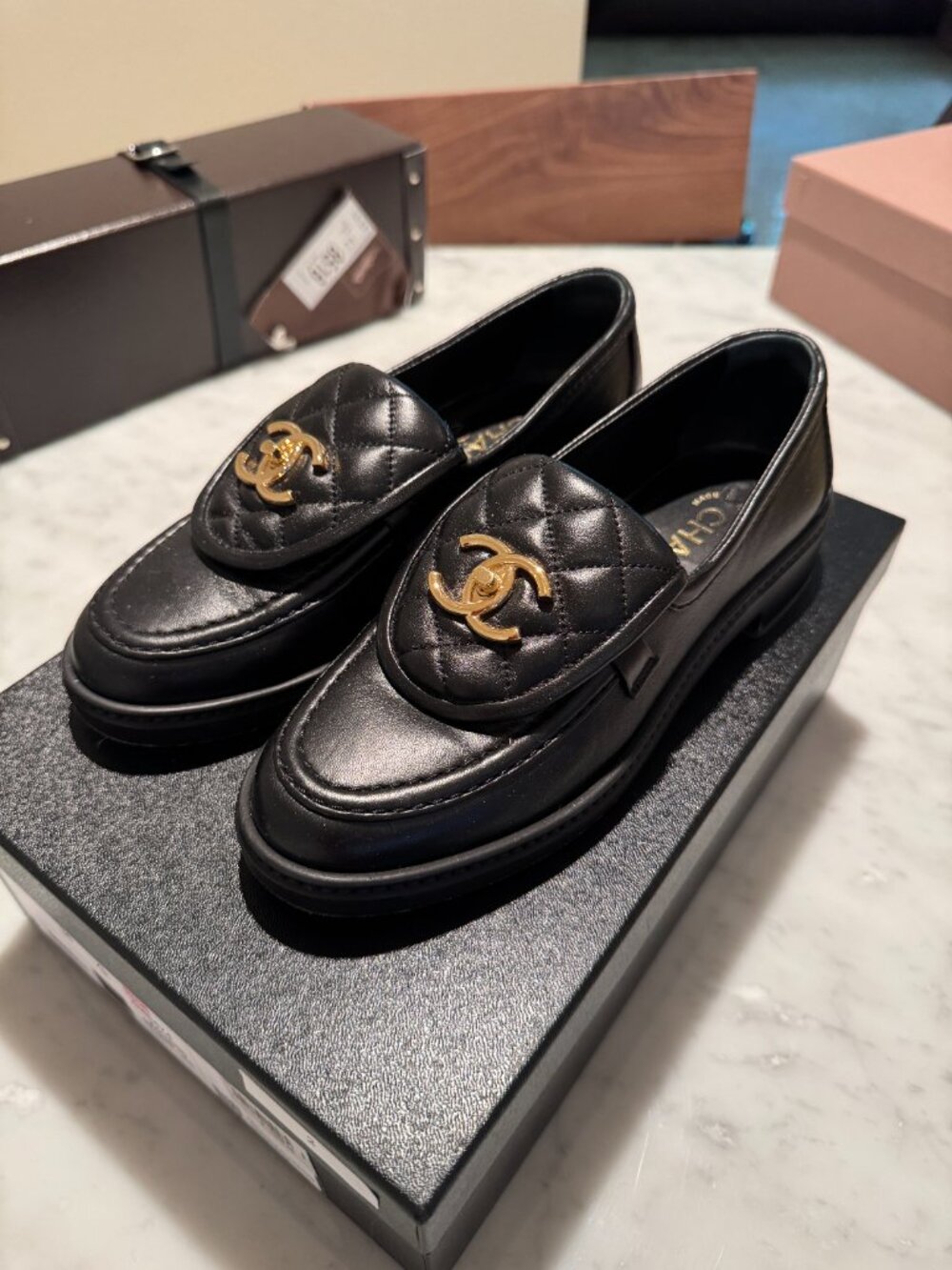 Chanel quilted turnlock loafers black leather size 36